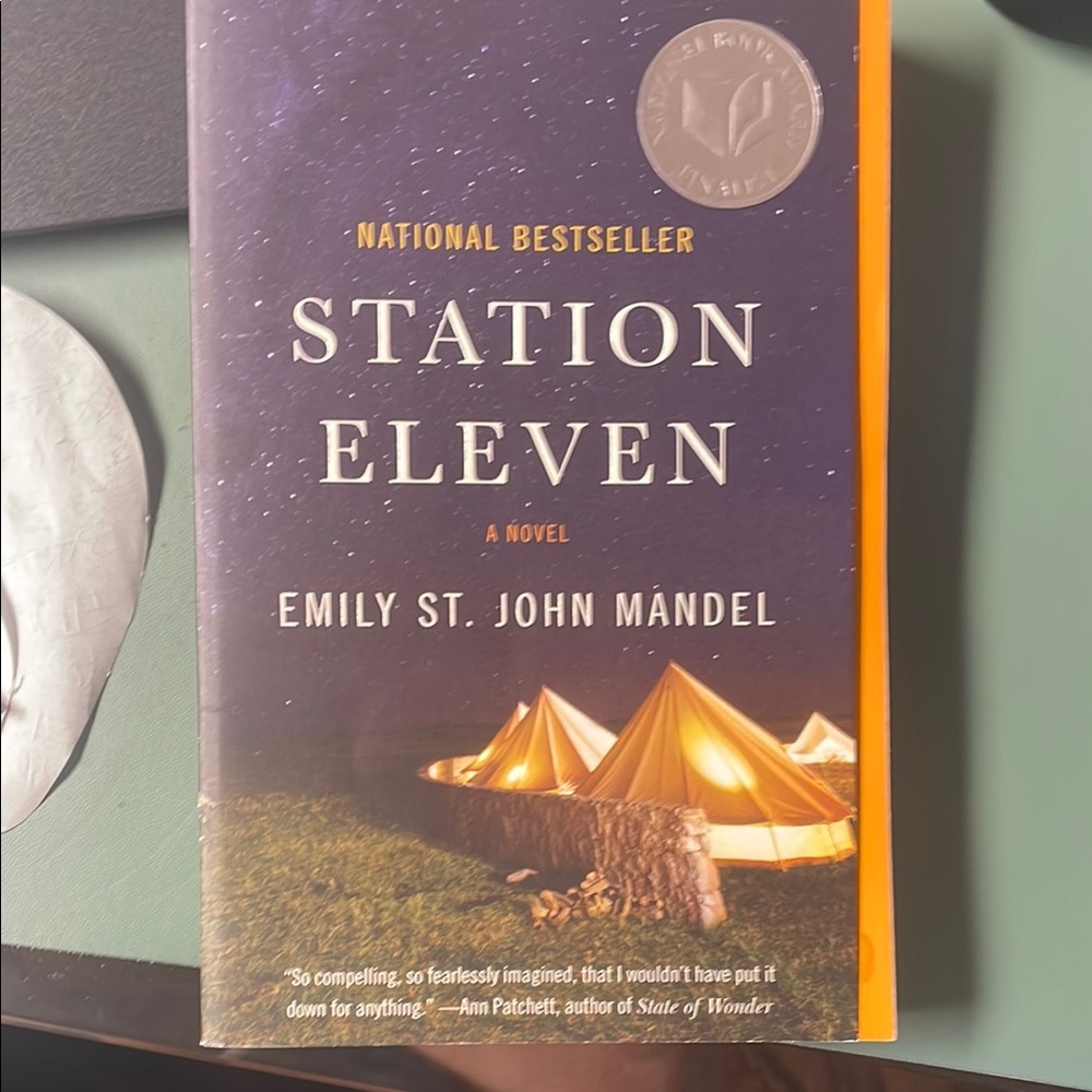 Station Eleven by Emily St. John Mandel - Purple and Orange Cover